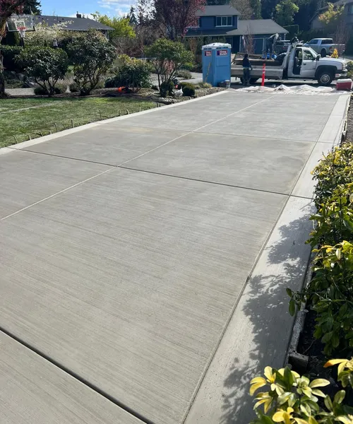 Broom Finish Driveway With Decorative Borders in Edmonds 